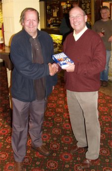 John Buckley of CAMRA presents Brian Hand of Longmeadow Sports and Social Centre with a copy of the Good Beer Guide 2007