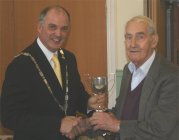 Ernie Bromley receives Vegetable Section Trophy