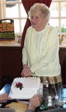 Brit Bromley cutting her 90th birthday cake